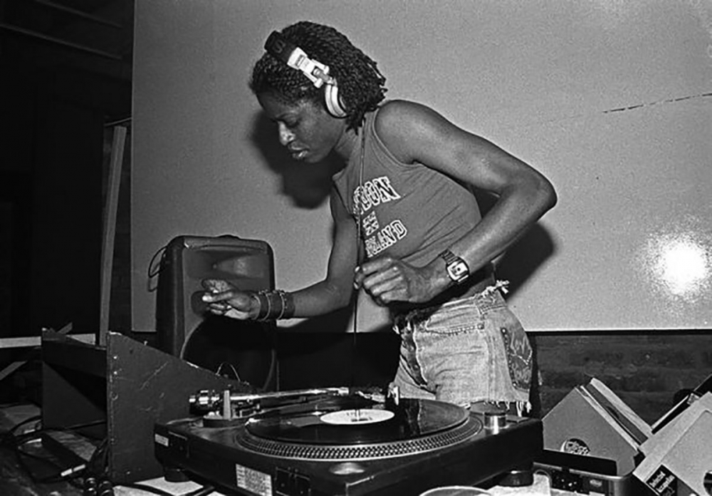DJ Paulette spinning some tunes on the decks